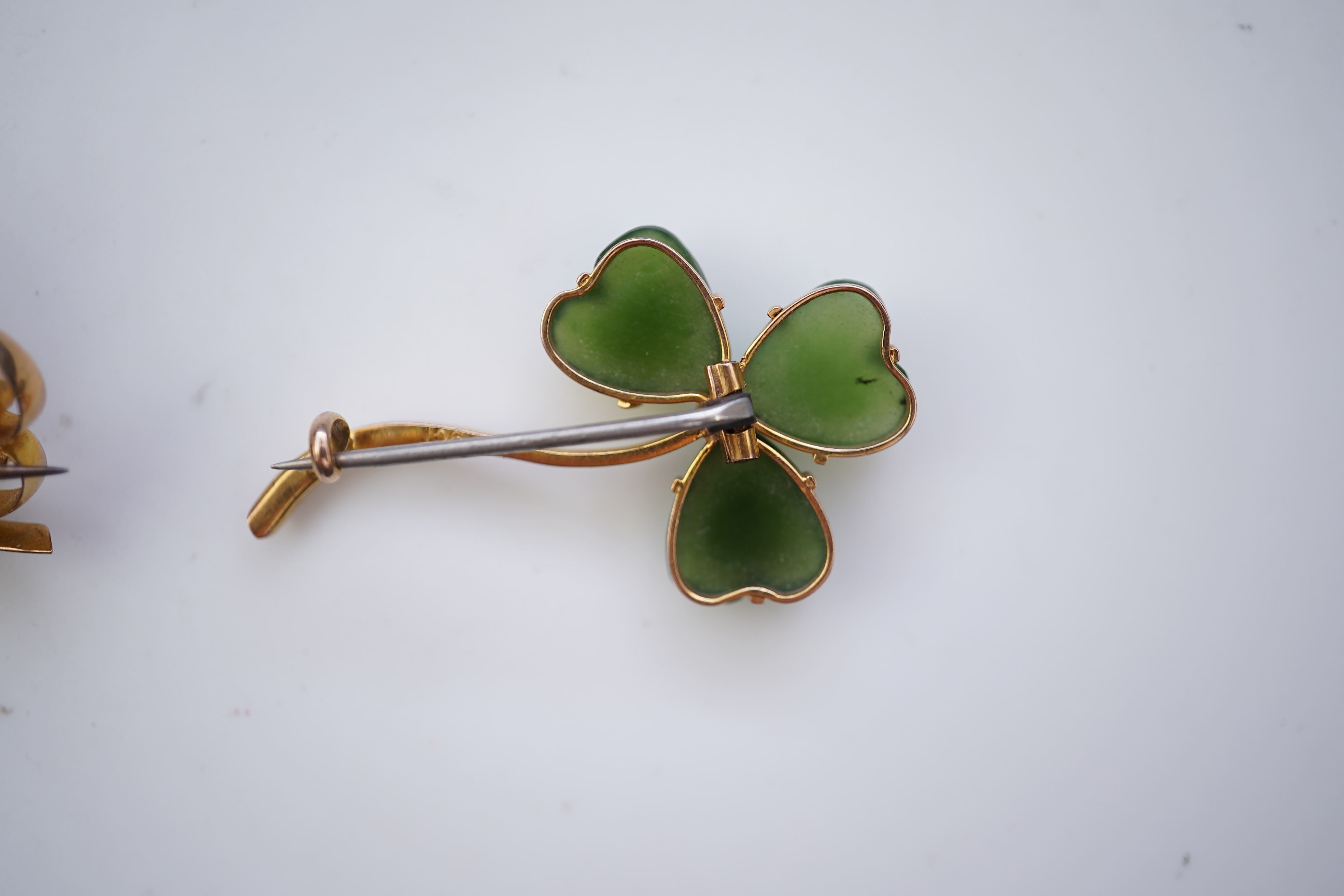 Two gem-set brooches
